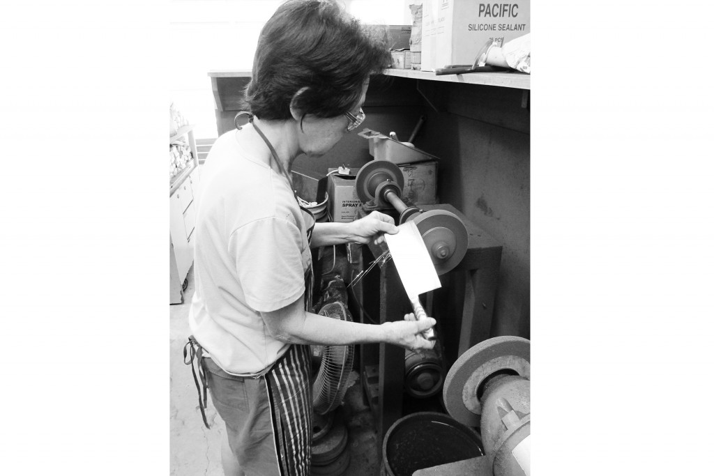Mdm. Lee in her 60s, has been operating her knife and scissor sharpening trade in Chinatown for more than 40 years.